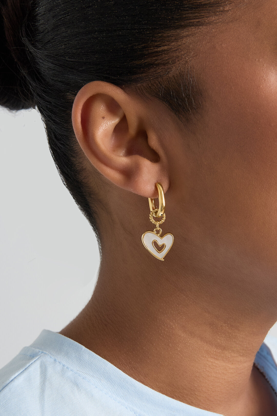 Squoval earrings with dangling mother-of-pearl hearts