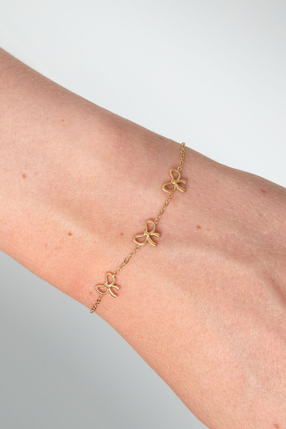 Armband | Charming bows | Goud