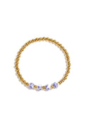 Solid beaded bracelet with beads in a blue floral print