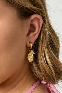 Earrings with beads and shell charm