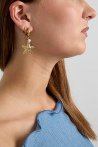 Earrings with starfish and pearl