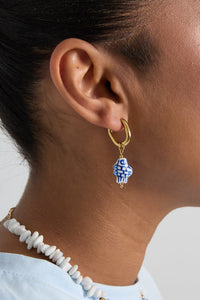 Squoval earrings with checkered fish charm