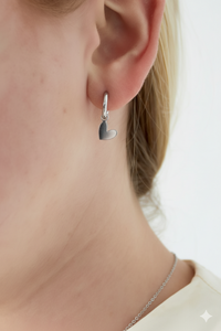 Oorbellen | Tilted heart | Zilver