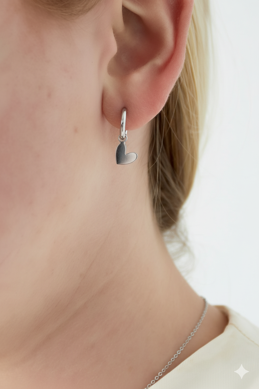 Oorbellen | Tilted heart | Zilver