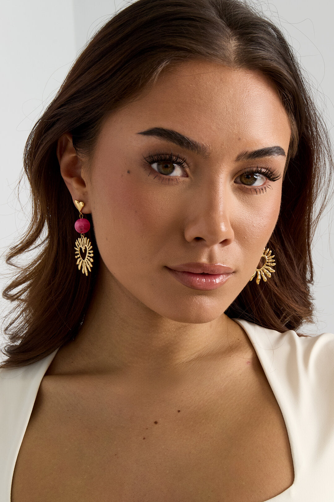 Heart earrings with statement bead
