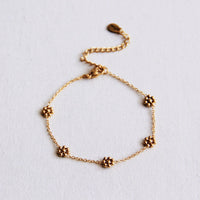 Gouden armband met madeliefjes | Stainless steel