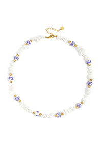 Necklaces with stone beads and white beads with blue flowers