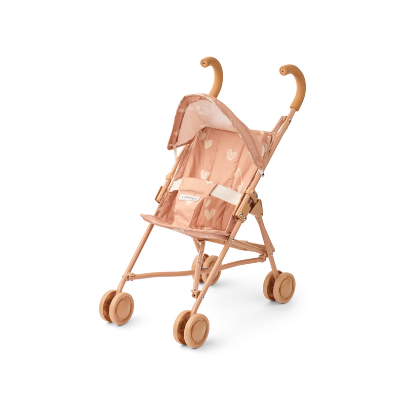 Poppenwagen Elsie van Liewood, in lichtroze met hartjesprint. Gemaakt van gepoedercoat metaal met vier dubbele wielen voor extra stabiliteit.